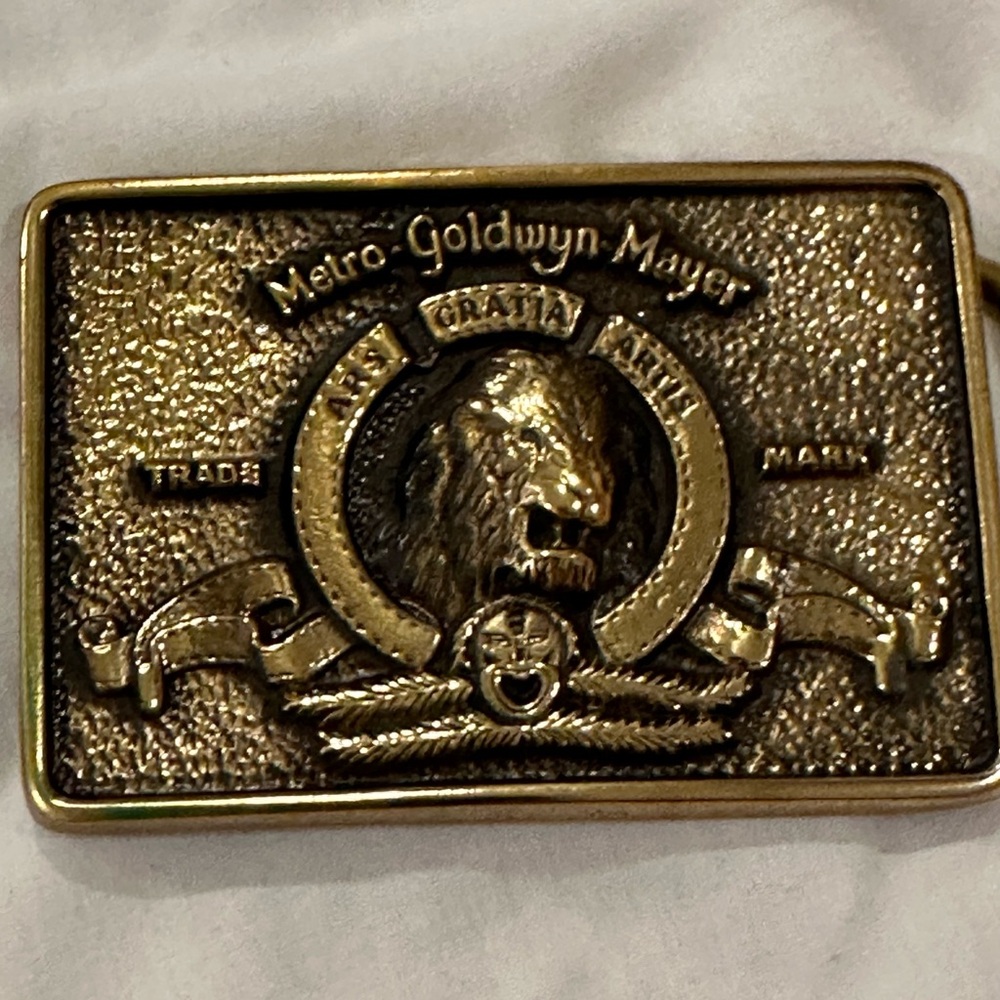 Metro Goldwyn Mayer solid brass belt buckle in box